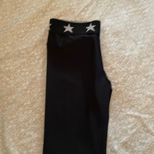 Katiejnyc shiny black leggings with star elastic waste